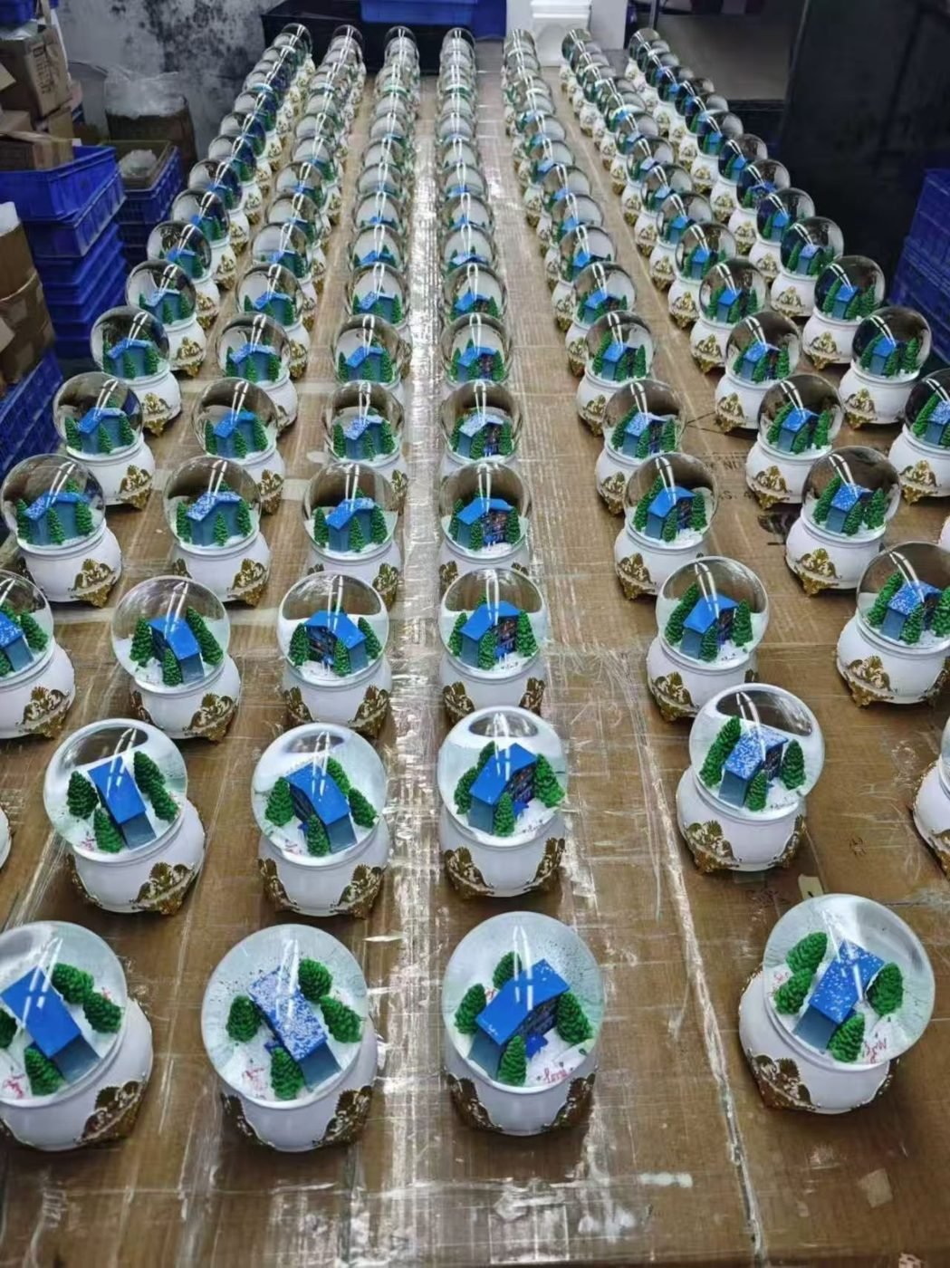 Snow Globe Production Floor — resin gift manufacturing workshop